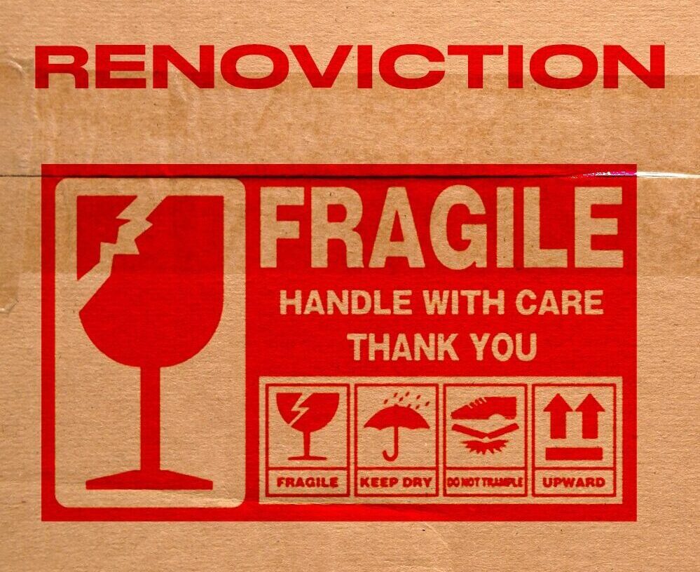 A taped box used for moving is labelled fragile.